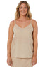 Woman wearing a beige camisole against a white background