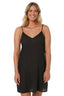 Woman wearing a black slip dress on a white background